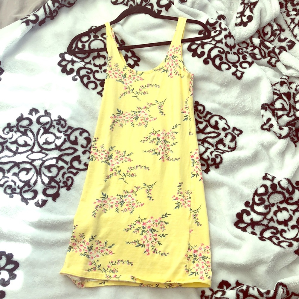 Yellow dress with cherry blossoms on it